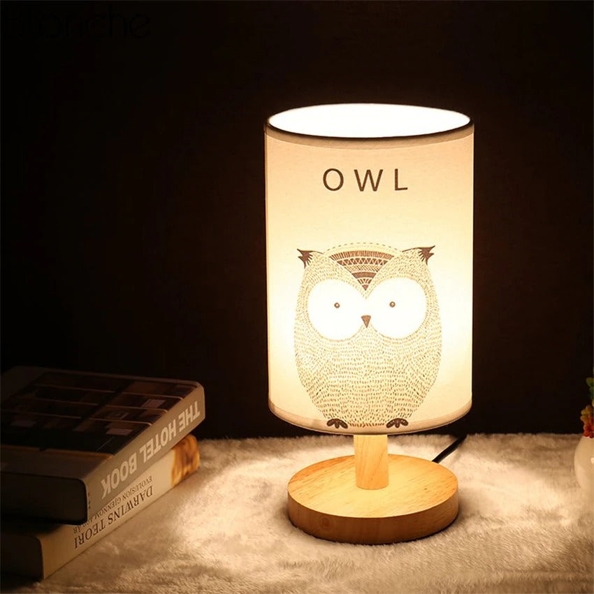 Wooden bedside lamp with animal shade