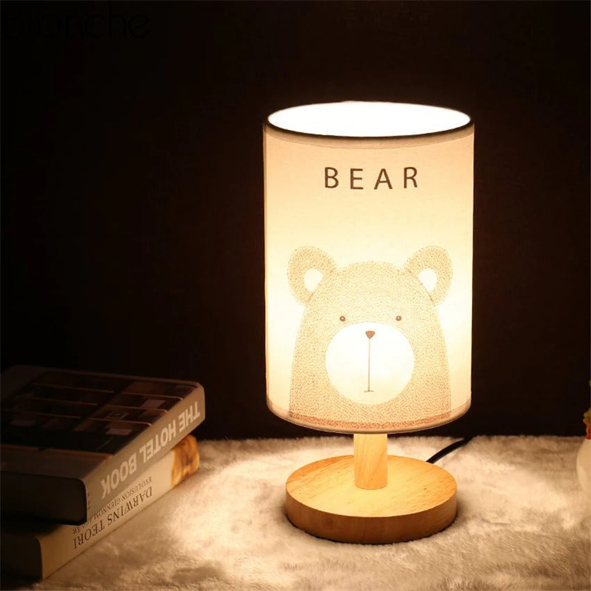 Wooden bedside lamp with animal shade